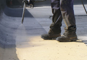 Coating systems over Boston spray foam roof systems